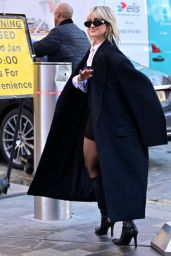 Ashley Roberts in a Long Black Coat, Black Mini Dress in London 01/18/2023