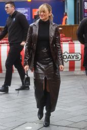 Ashley Roberts in Chocolate Leather Skirt and Jacket With Knee High Boots - London 01/13/2023