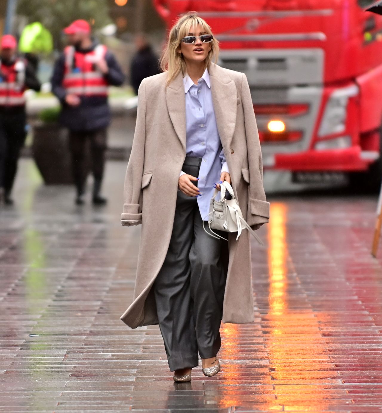Ashley Roberts in Grey Deep Pleated Trousers and a Blue Shirt in London ...