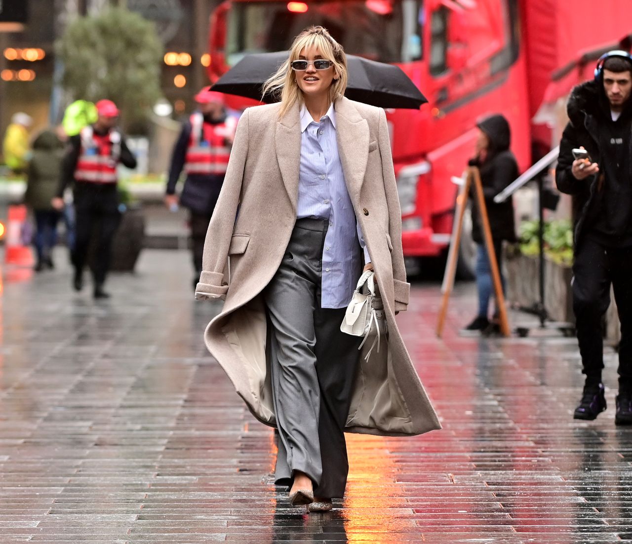 Ashley Roberts in Grey Deep Pleated Trousers and a Blue Shirt in London ...