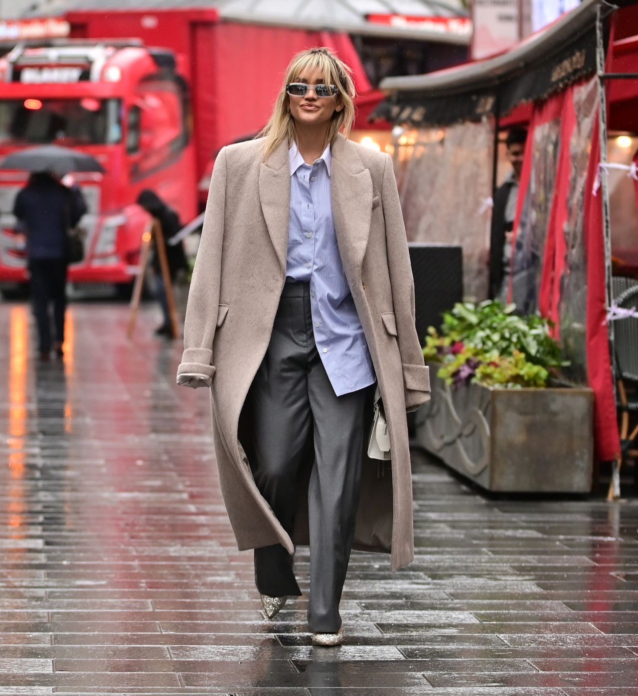 Ashley Roberts in Grey Deep Pleated Trousers and a Blue Shirt in London ...