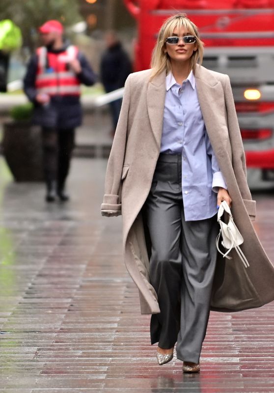 Ashley Roberts in Grey Deep Pleated Trousers and a Blue Shirt in London