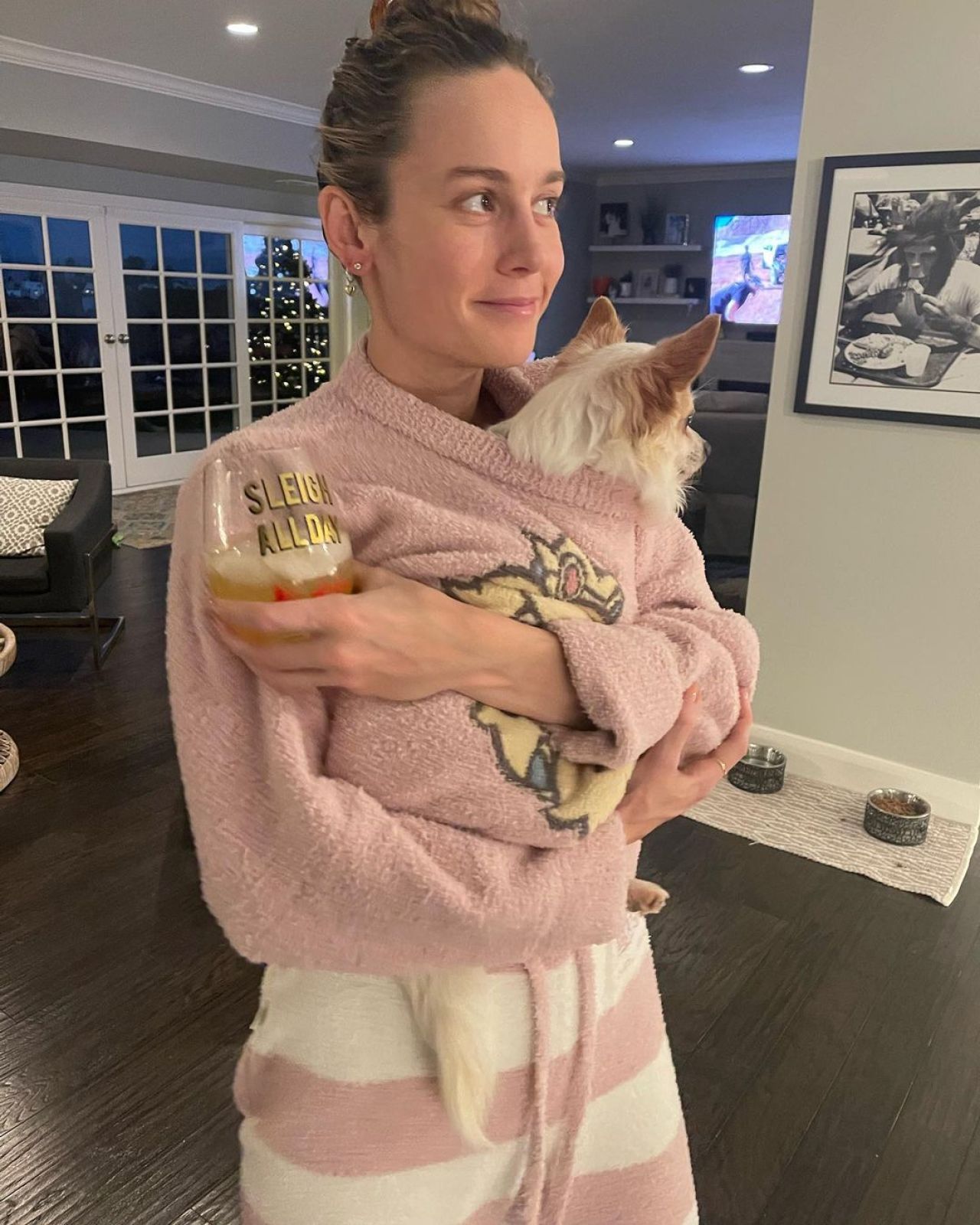 Cute Brie Larson goofing around with her dog