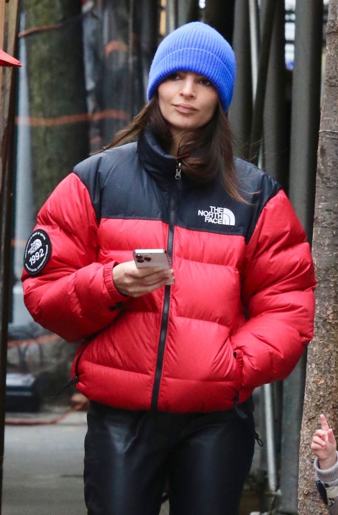 Emily Ratajkowski in a Red Puffer Jacket and Black Leather Pants - New ...