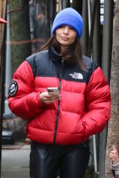 Emily Ratajkowski in a Red Puffer Jacket and Black Leather Pants - New York 01/14/2023