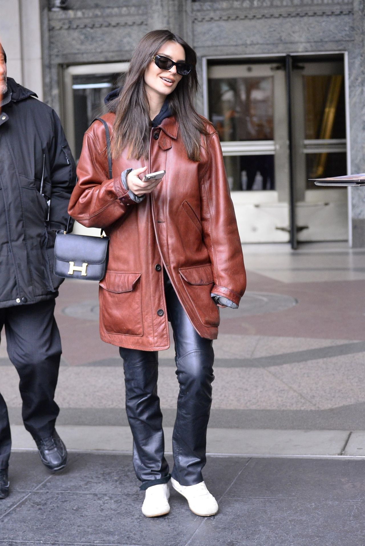 Emily Ratajkowski Wears a Dark Brown Leather Jacket and Matching Black ...
