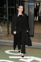 Emma Roberts Wearing a Black Top Featuring a Giant Black Rose and Black Pants - New York 01/18/2023