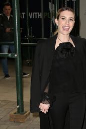 Emma Roberts Wearing a Black Top Featuring a Giant Black Rose and Black Pants - New York 01/18/2023