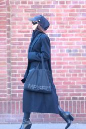 Irina Shayk Wearing Fashionable Black Getup Pairing Leather Boots with a Lengthy Black Overcoat - West Village 01/30/2023
