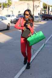 Justine Skye Wears Bright Red Jumpsuit With a Plunging Zipper Down the Front and Nike Sneakers - LA 01/06/2023