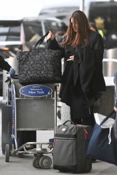 Monica Bellucci in an All-black Ensemble at JFK Airport in New York 01/28/2023