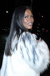 Nia Long in a White Feather Coat and Black Leather Romper 01/25/2023