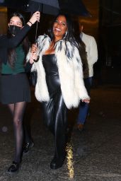 Nia Long in a White Feather Coat and Black Leather Romper 01/25/2023