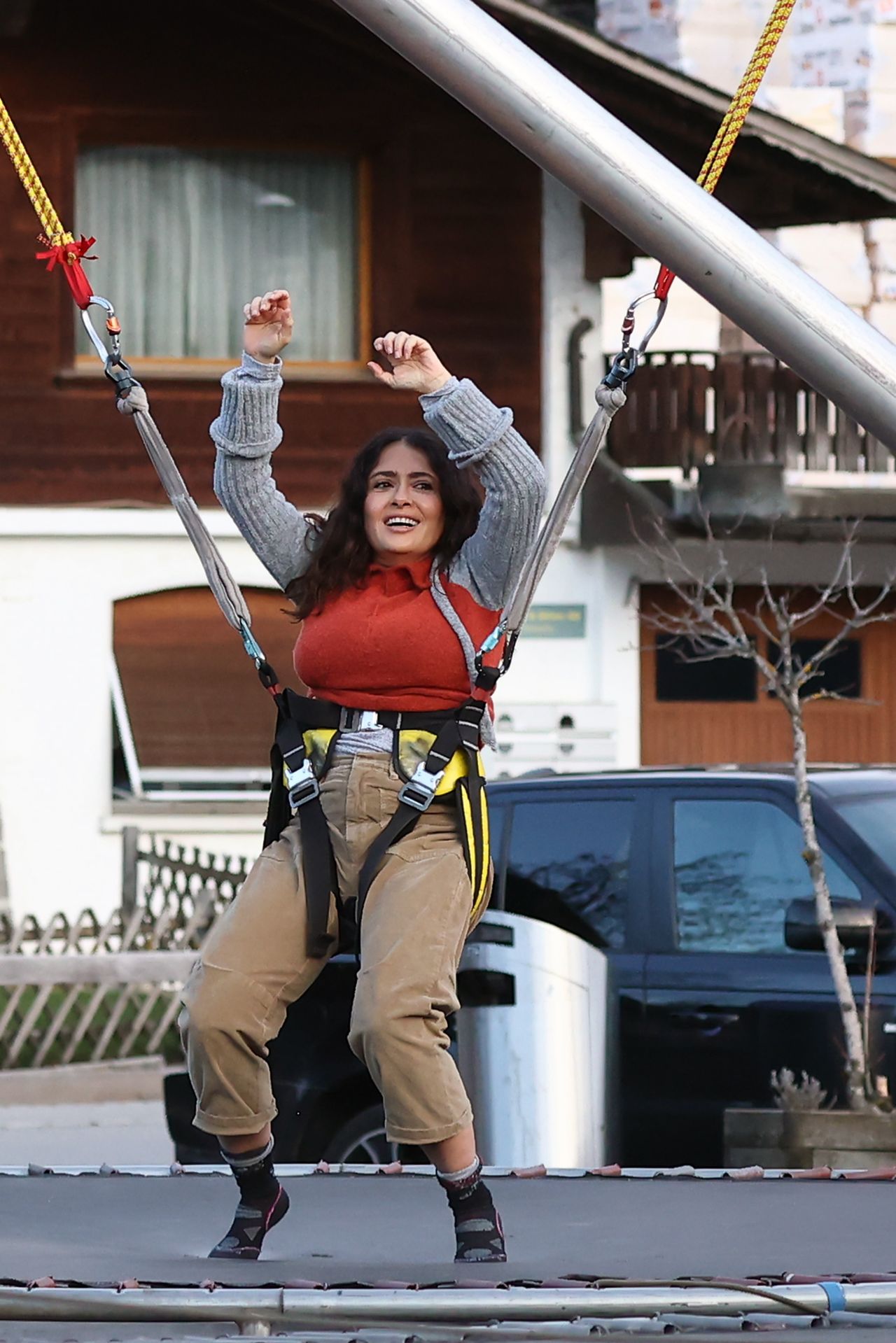 Salma Hayek on a Bungee Trampoline in Gstaad 01/01/2023 • CelebMafia