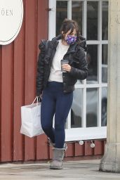 Zooey Deschanel Wears Puffy Jacket, Navy Leggings and Cozy UGG Boots - Brentwood 01/03/2023