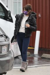 Zooey Deschanel Wears Puffy Jacket, Navy Leggings and Cozy UGG Boots - Brentwood 01/03/2023