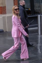Amanda Holden in a Pink Trouser Suit and Matching Shoes and Bag in London 02/22/2023