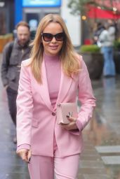 Amanda Holden in a Pink Trouser Suit and Matching Shoes and Bag in London 02/22/2023