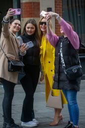 Amanda Holden in an Eye-Catching Yellow Dress - London 02/20/2023