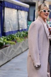 Ashley Roberts in a Beige and White Patterned Shirt and Matching Wide Legged Trousers - London 02/01/2023