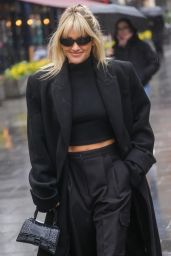 Ashley Roberts in a Black Crop Top and Trousers in London 02/22/2023