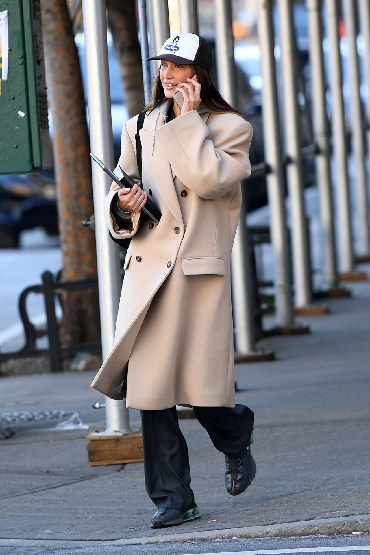 Bella Hadid Wearing Trench Coat and Salomon Sneakers Manhattan 02/08