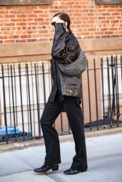 Irina Shayk Wears a Trendy Oversized Leather Jacket and Black Shades - New York 02/15/2023