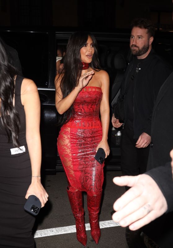 Kim Kardashian Wearing Red Ensemble at the Dolce & Gabbana Party in Milan 02/25/2023