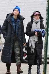 Natalia Dyer Wearing a Huge Scarf With a Long Puffer Jacket - NYC 02/25/2023