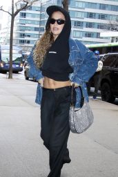Rita Ora in a Cropped Black Jumper and a Dark Blue Denim Jacket - NYC 01/30/2023