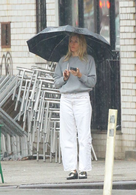 Sienna Miller in a Grey Top and White Pants - New York 02/16/2023