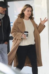 Alicia Silverstone in Camel Trench Overcoat at Alfred