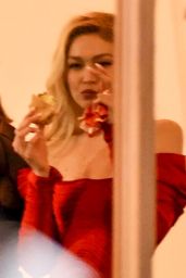 Gigi Hadid - Munches on an In-N-Out Burger Outside the 2023 Vanity Fair Oscar Party 03/12/2023