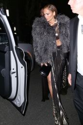 Jennifer Lopez Wears Feathered Top and a Slit Black Satin Dress - Revolve Launch Party in LA 03/18/2023