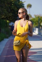 Kimberley Garner in a Yellow Swimsuit - Beach in Miami 03/01/2023