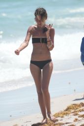 Libbie Mugrabi in a Bikini - Morning Beach Walk in Miami 03/26/2023
