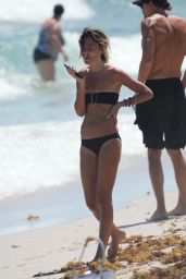 Libbie Mugrabi in a Bikini - Morning Beach Walk in Miami 03/26/2023