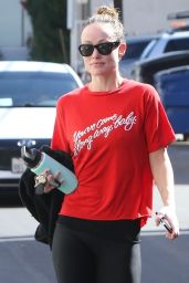 Olivia Wilde Wearing a Red Top, Black Yoga Pants and Sunglasses in Studio City 03/07/2023