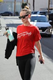 Olivia Wilde Wearing a Red Top, Black Yoga Pants and Sunglasses in Studio City 03/07/2023
