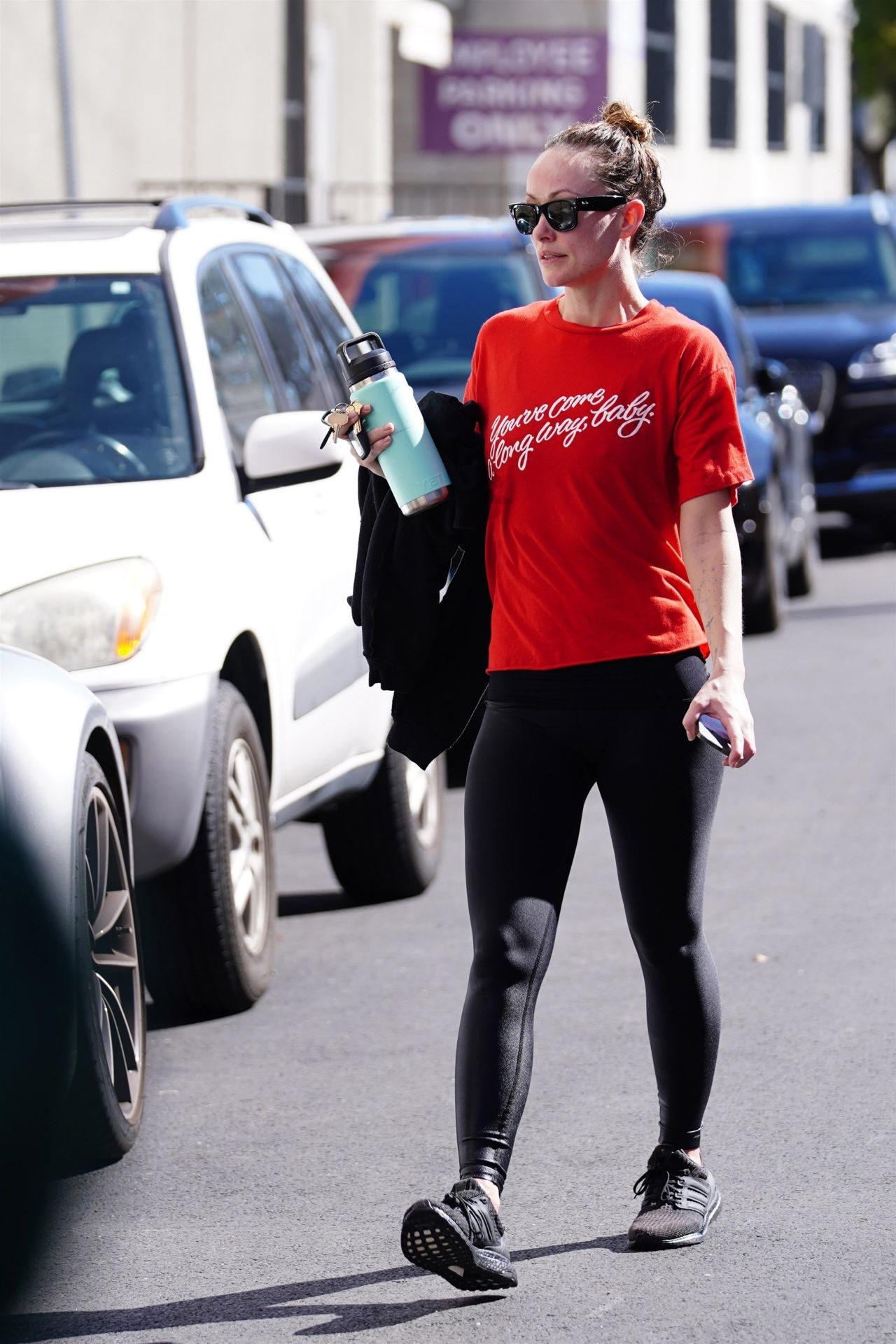 Olivia Wilde Wearing a Red Top, Black Yoga Pants and Sunglasses in Studio  City 03/07/2023 • CelebMafia