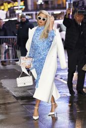 Paris Hilton Wears a Baby Blue Floral Dress in New York 03/14/2023