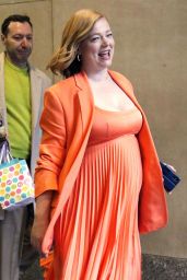 Sarah Snook in Bright Orange Pleated Dress - Exiting NBC