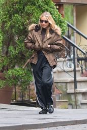 Chloe Sevigny Wearing a Brown Coat and Adidas Sweat Pants - New York 04/28/2023