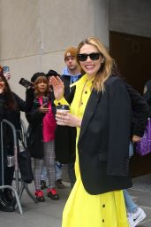 Elizabeth Olsen Wearing Yellow Dress With a Black Blazer on Top - New York 04/19/2023