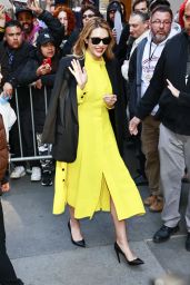 Elizabeth Olsen Wearing Yellow Dress With a Black Blazer on Top - New York 04/19/2023