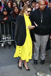 Elizabeth Olsen Wearing Yellow Dress With a Black Blazer on Top - New York 04/19/2023