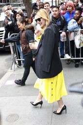 Elizabeth Olsen Wearing Yellow Dress With a Black Blazer on Top - New York 04/19/2023