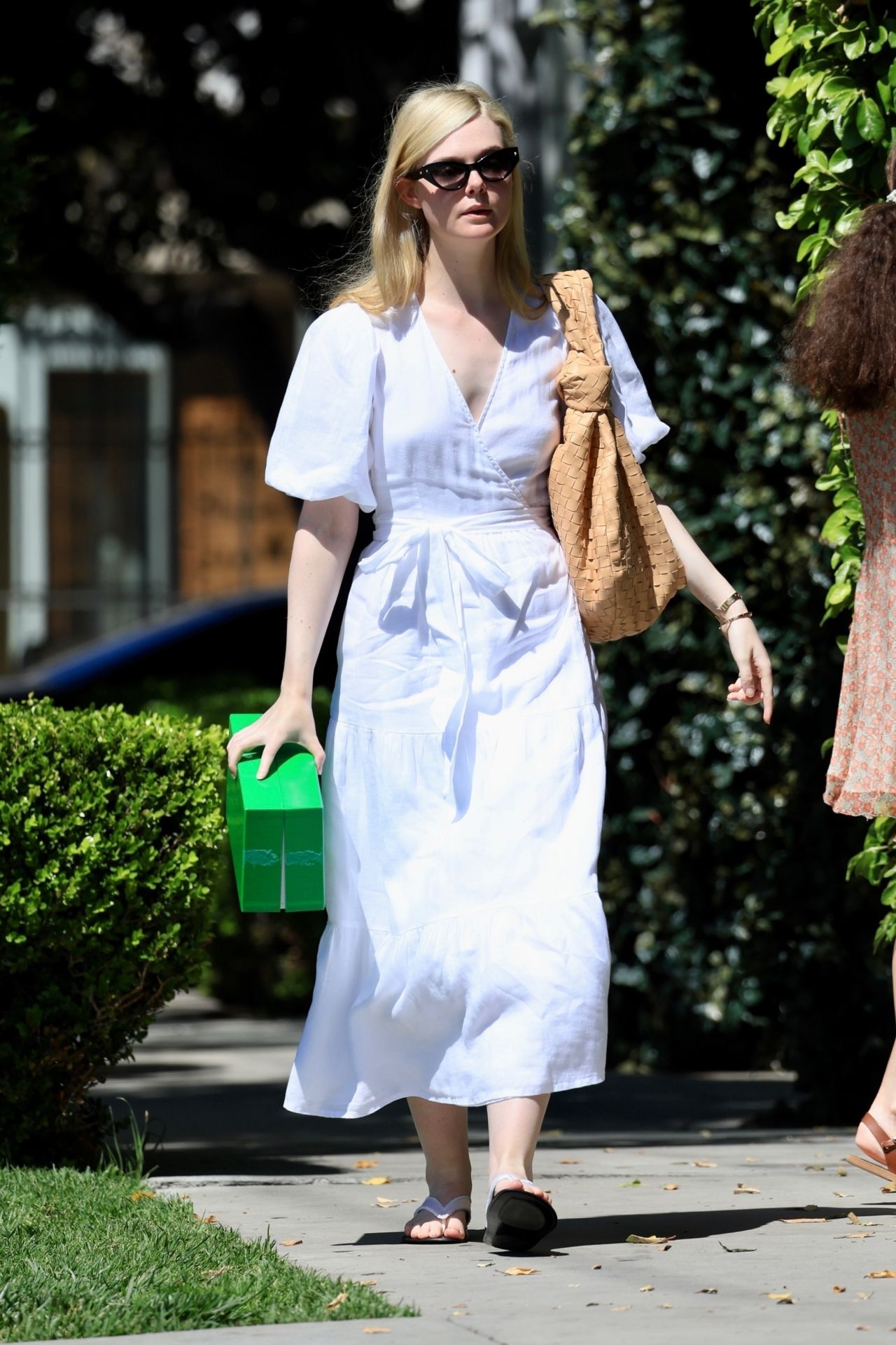 Elle Fanning in a White Spring Dress and Matching Slippers - Bottega