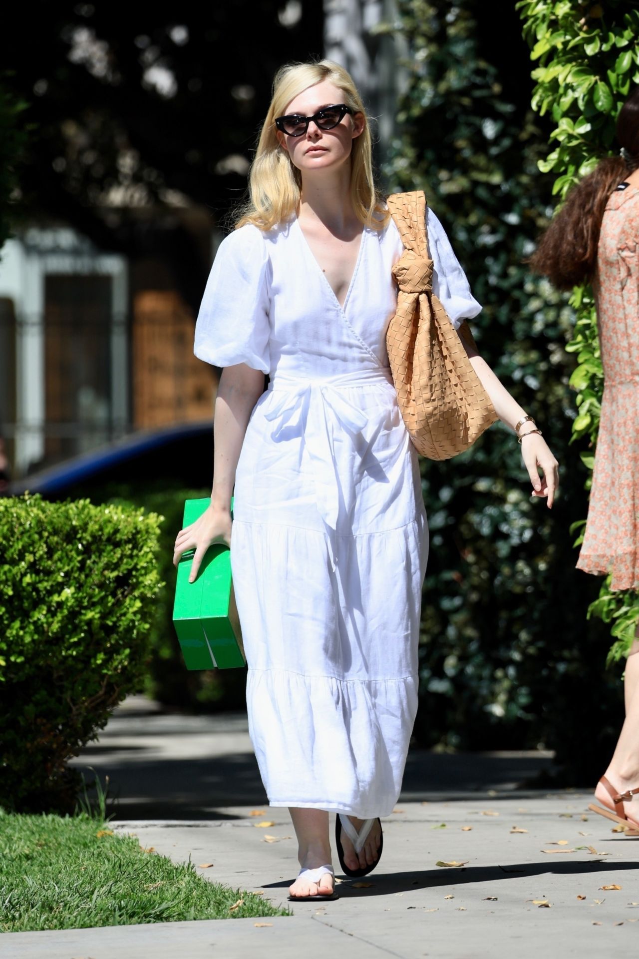 Elle Fanning in a White Spring Dress and Matching Slippers - Bottega