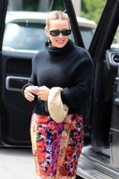 Hilary Duff in a Floral Print Skirt and Black Turtleneck Sweater - Beverly Hills 04/16/2023